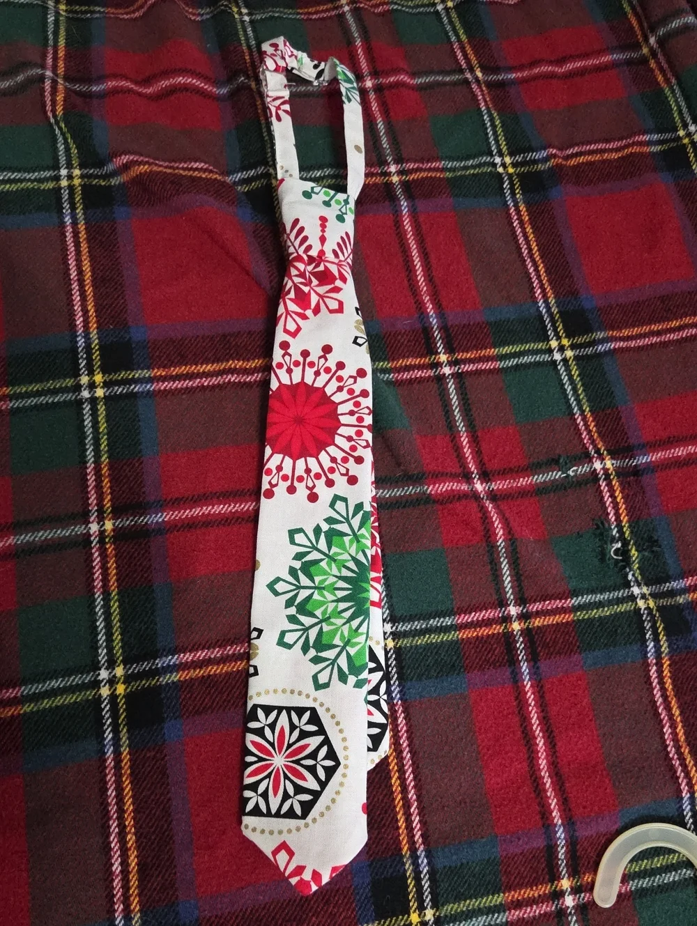 Kids Holiday Print Necktie in White with Red and Green Snowflake Motifs